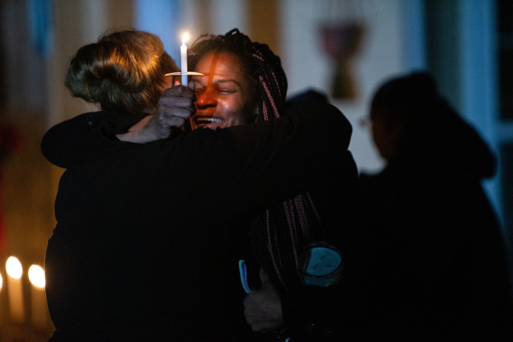 Candlelight vigil reclaims house where three were killed in Bethalto